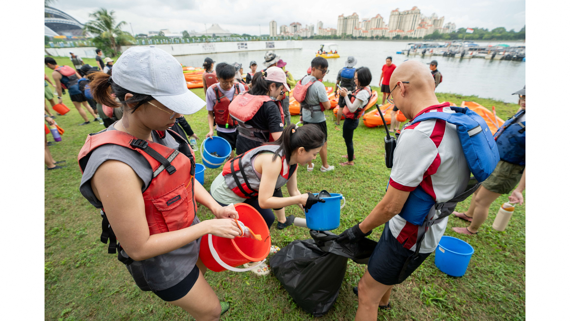 Participants tallying the total weight of trash collected