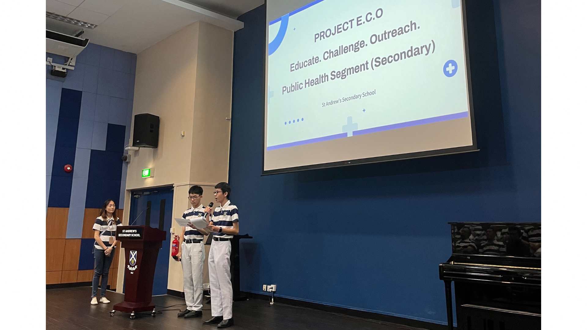 Students Simon and Ze Xuan sharing with their schoolmates on their Project E.C.O.