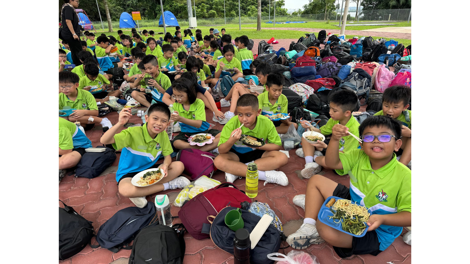 Students using reusable containers during camp